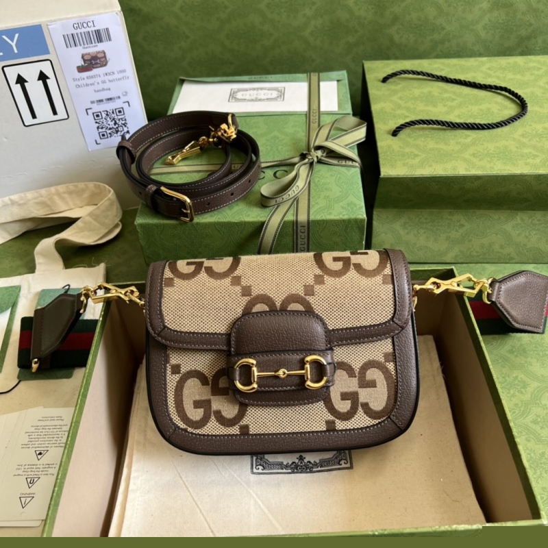 G*u*i satchel bags
